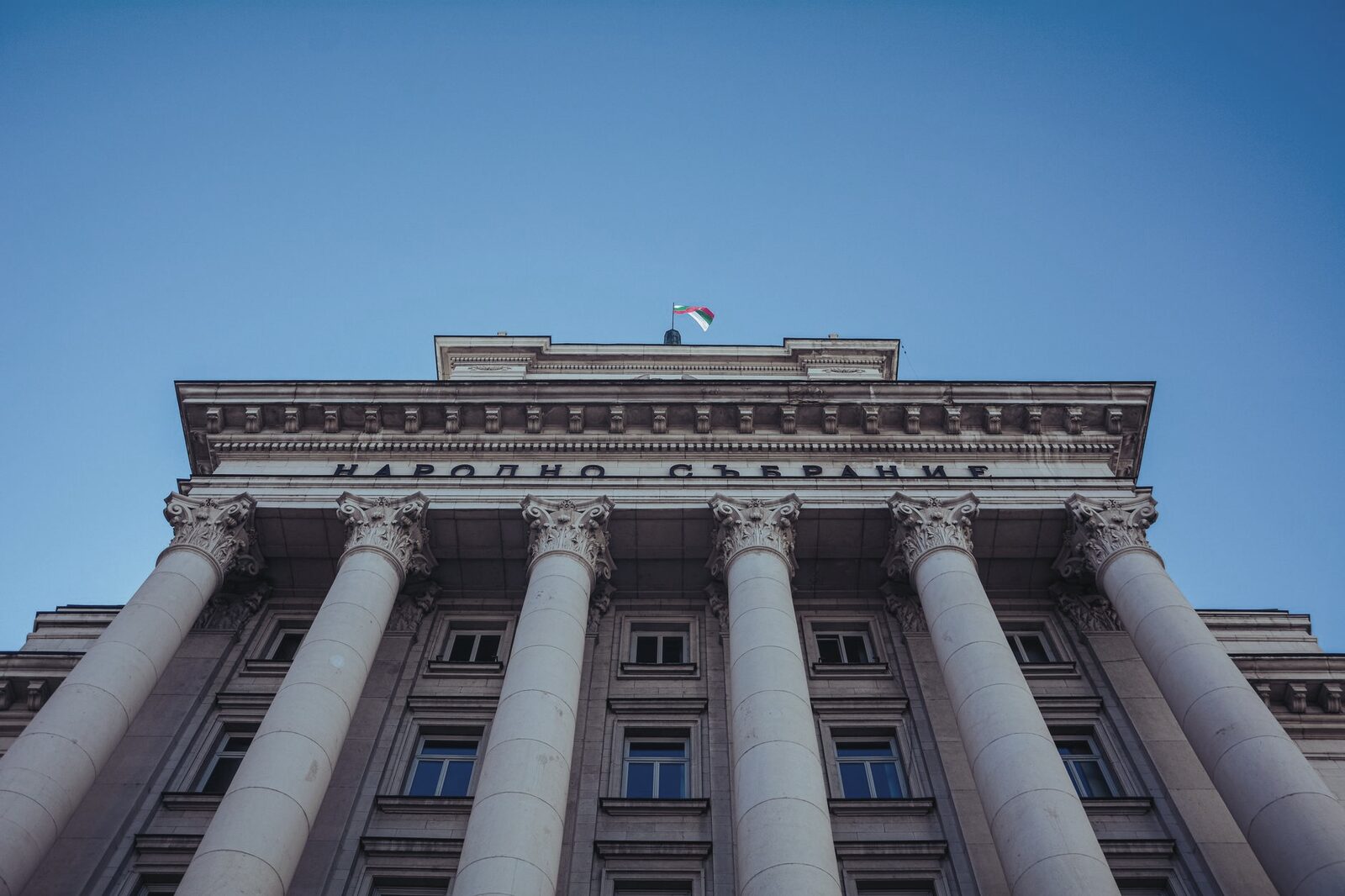 The colonnaded facade of a national parliament building